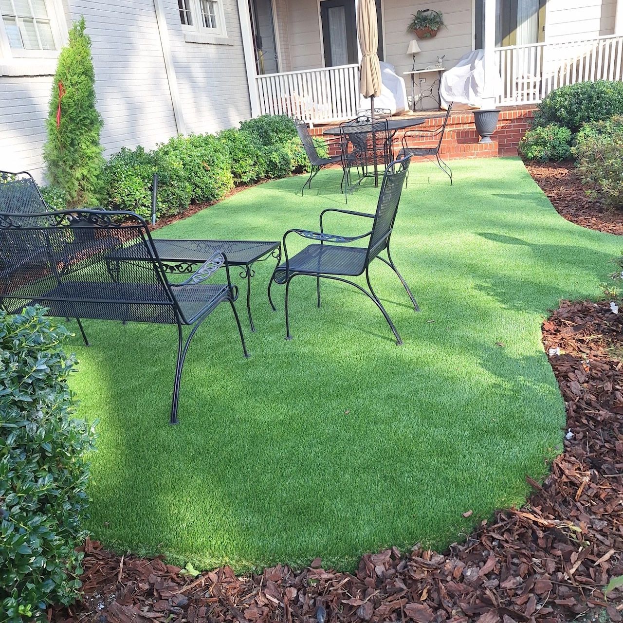 A freshly topdressed, level lawn area